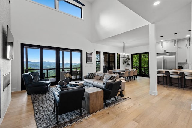 55 Steeplebush Ct, Tuckasegee, NC 28783 - living room with light wood-type flooring, healthy amount of natural light, a chandelier, recessed lighting, and a mountain view