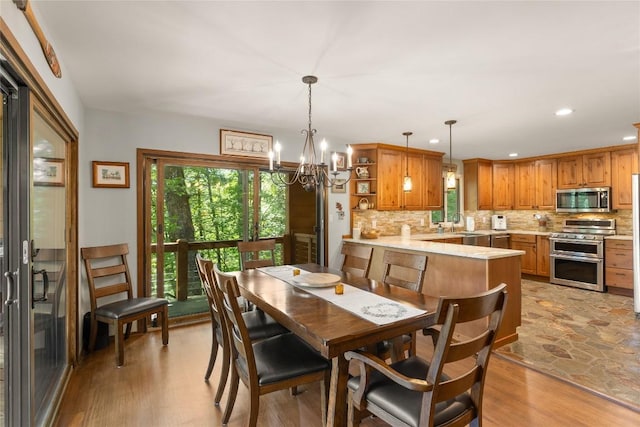 230 Jersey Trl Unit 12, Sapphire, NC 28774 - dining space with a chandelier, light wood-style flooring, and recessed lighting