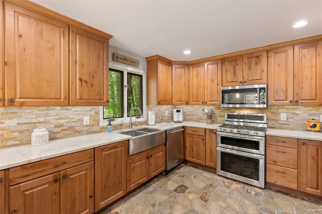 230 Jersey Trl Unit 12, Sapphire, NC 28774 - kitchen featuring stainless steel appliances, decorative backsplash, light stone finish flooring, recessed lighting, and light stone counters