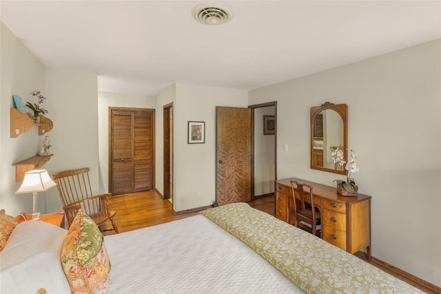 230 Jersey Trl Unit 12, Sapphire, NC 28774 - bedroom featuring wood finished floors and a closet