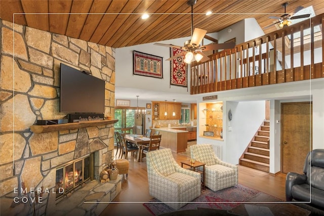 230 Jersey Trl Unit 12, Sapphire, NC 28774 - living area featuring ceiling fan, wooden ceiling, stairs, wood finished floors, and vaulted ceiling