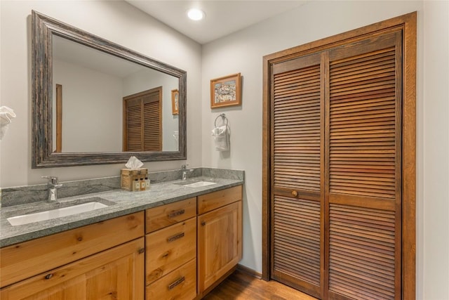 230 Jersey Trl Unit 12, Sapphire, NC 28774 - full bath with double vanity, a closet, wood finished floors, and recessed lighting