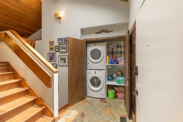230 Jersey Trl Unit 12, Sapphire, NC 28774 - washroom featuring stacked washer / drying machine and stone finish flooring