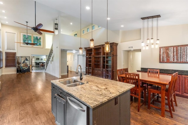 314 Beckonridge Trl, Sapphire, NC 28774 - kitchen featuring stainless steel dishwasher, a ceiling fan, a high ceiling, open floor plan, and wood finished floors