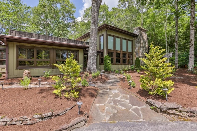 314 Beckonridge Trl, Sapphire, NC 28774 - view of front facade with a chimney