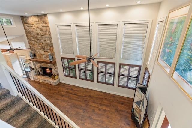 314 Beckonridge Trl, Sapphire, NC 28774 - living room with ceiling fan, recessed lighting, a fireplace, wood finished floors, and stairway