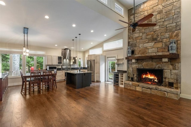 314 Beckonridge Trl, Sapphire, NC 28774 - kitchen featuring exhaust hood, wine cooler, an island with sink, dark wood-type flooring, and ceiling fan