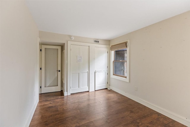 314 Beckonridge Trl, Sapphire, NC 28774 - unfurnished bedroom featuring wood finished floors and a closet