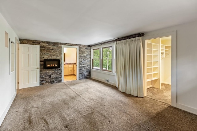 314 Beckonridge Trl, Sapphire, NC 28774 - unfurnished living room featuring carpet and a fireplace