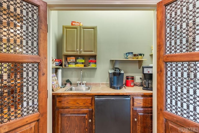 bar featuring black dishwasher and sink