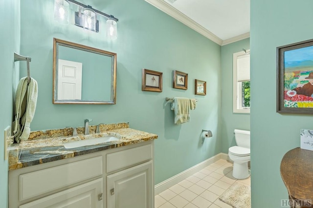 bathroom with crown molding, vanity, toilet, and tile patterned flooring