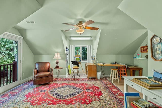 interior space featuring lofted ceiling, light hardwood / wood-style flooring, and ceiling fan