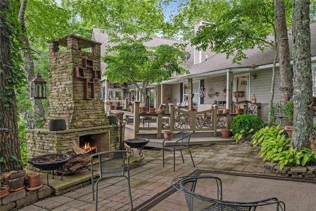 546 Upsy Daisy Ln, Cullowhee, NC 28723 - view of patio featuring an outdoor stone fireplace