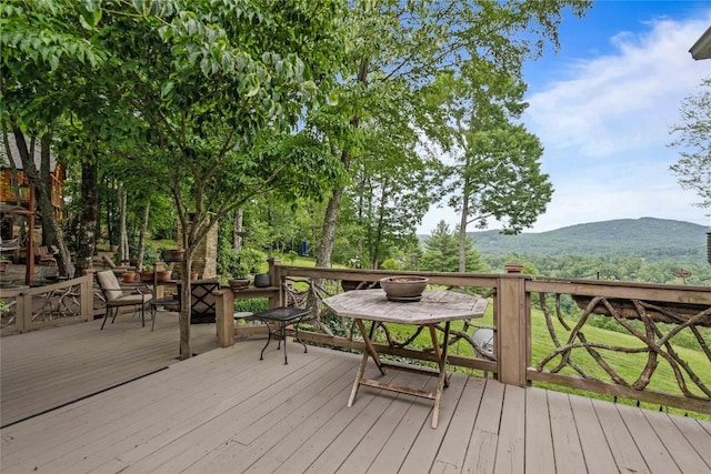 546 Upsy Daisy Ln, Cullowhee, NC 28723 - wooden deck featuring a mountain view and outdoor dining space