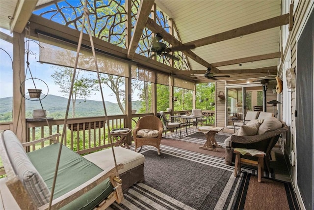 546 Upsy Daisy Ln, Cullowhee, NC 28723 - sunroom with ceiling fan, an outdoor living space, a mountain view, and plenty of natural light