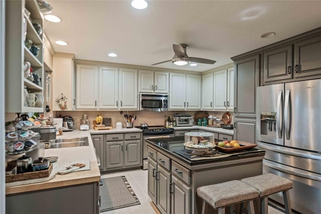 546 Upsy Daisy Ln, Cullowhee, NC 28723 - kitchen featuring stainless steel appliances, gray cabinetry, a ceiling fan, recessed lighting, and light tile patterned floors