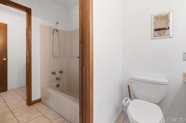 bathroom with shower / bathtub combination, tile patterned floors, and toilet