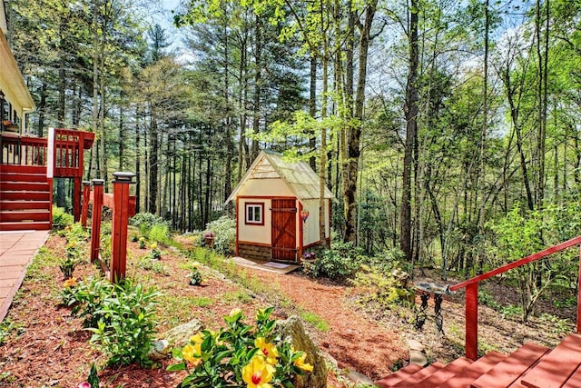 400 Cole Mountain Cir, Highlands, NC 28741 - view of yard featuring a storage unit, an outbuilding, stairs, and a deck