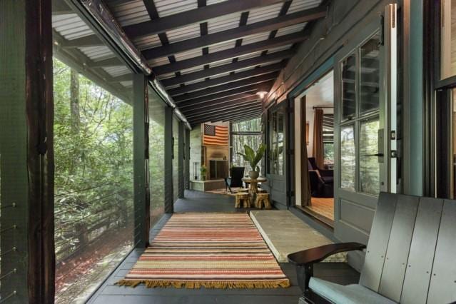 view of patio featuring a balcony