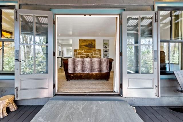 doorway with hardwood / wood-style floors