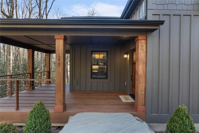 149 Woodland Hill Dr, Highlands, NC 28741 - entrance to property featuring a porch and board and batten siding
