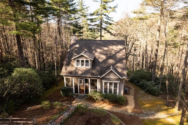 53 Rocky Top Dr, Cashiers, NC 28717 - rear view of house with a sunroom and a chimney
