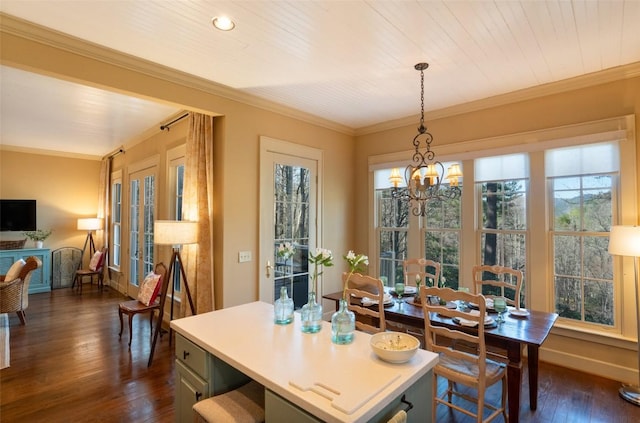 53 Rocky Top Dr, Cashiers, NC 28717 - dining area with dark wood-type flooring, ornamental molding, healthy amount of natural light, a chandelier, and french doors