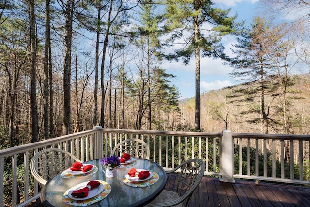 53 Rocky Top Dr, Cashiers, NC 28717 - wooden terrace featuring outdoor dining space