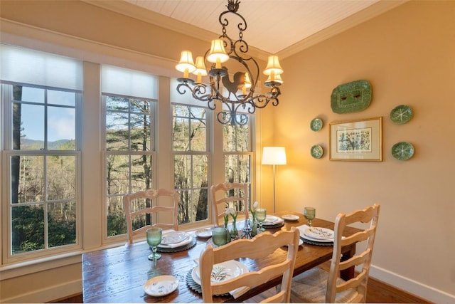 53 Rocky Top Dr, Cashiers, NC 28717 - dining room with baseboards, ornamental molding, a chandelier, and wood finished floors