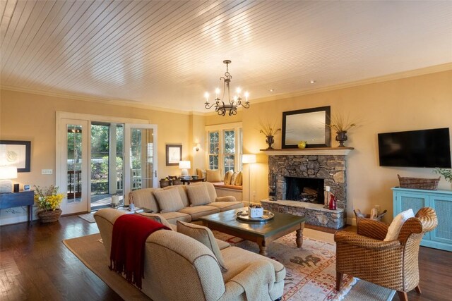 53 Rocky Top Dr, Cashiers, NC 28717 - living room featuring a chandelier, wood finished floors, a fireplace, ornamental molding, and wood ceiling