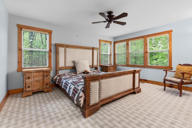 599 Tower Rd, Sapphire, NC 28774 - bedroom featuring baseboards, carpet floors, and ceiling fan