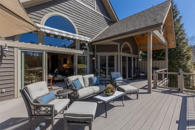 wooden terrace featuring an outdoor living space