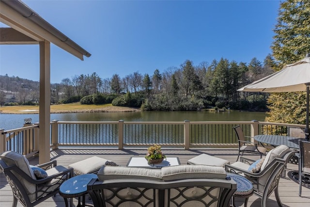 wooden deck with a water view