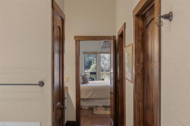 hallway with wood finished floors