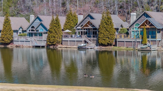 property view of water featuring stairs