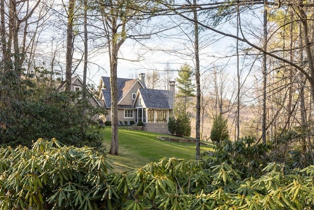 542 Cross Creek Trl, Cullowhee, NC 28723 - view of front of home featuring a chimney and a front lawn
