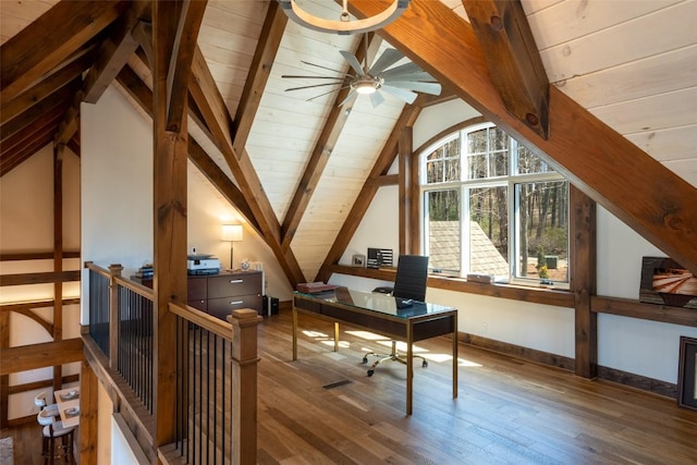 home office with hardwood / wood-style floors, baseboards, ceiling fan, vaulted ceiling with beams, and wood ceiling