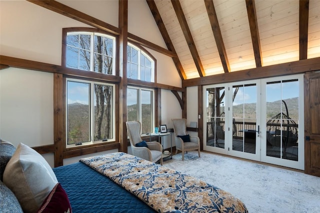bedroom featuring access to outside, high vaulted ceiling, french doors, wooden ceiling, and beamed ceiling