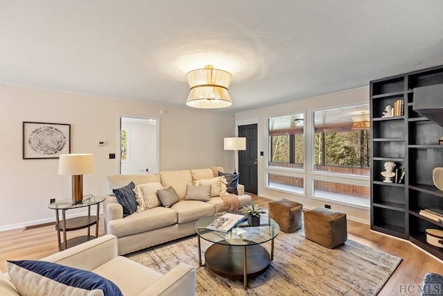 living room with light hardwood / wood-style flooring