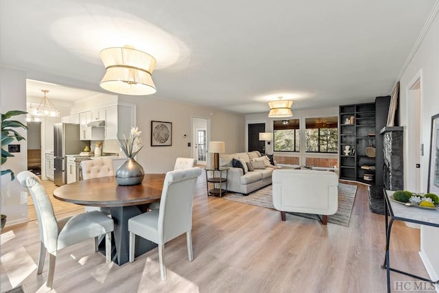 dining room with light hardwood / wood-style flooring