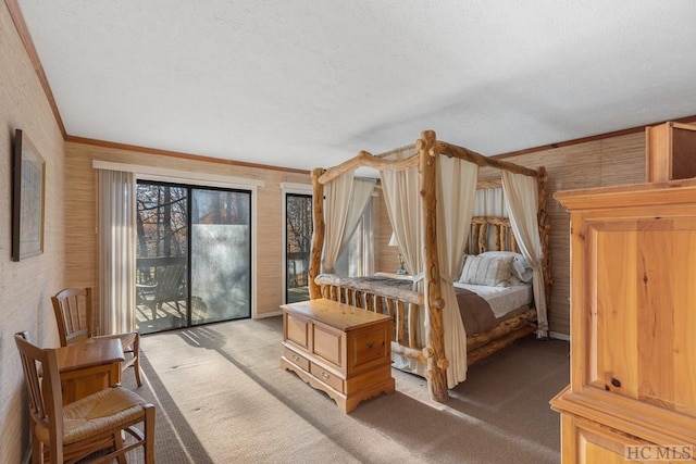 bedroom featuring crown molding, carpet flooring, and access to exterior