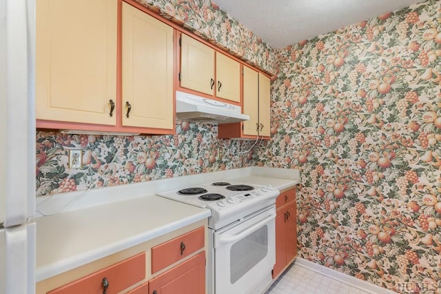 kitchen with white electric range oven and a textured ceiling