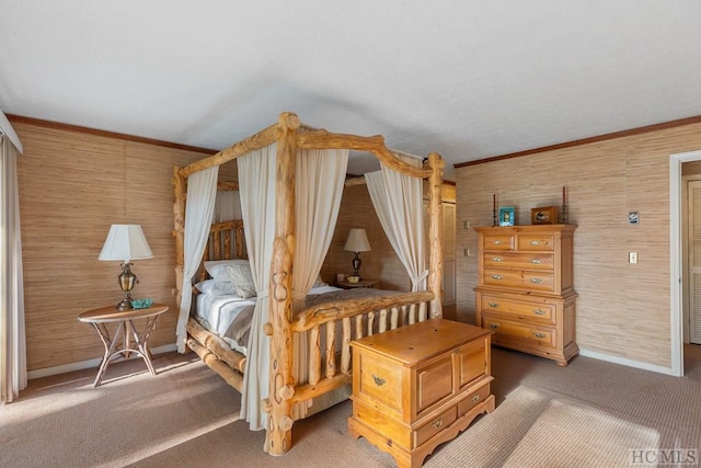 carpeted bedroom featuring crown molding