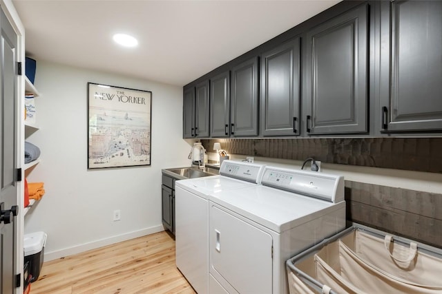 42 W Black Rock Cir, Highlands, NC 28741 - washroom featuring cabinet space, washer and clothes dryer, light wood-type flooring, and recessed lighting