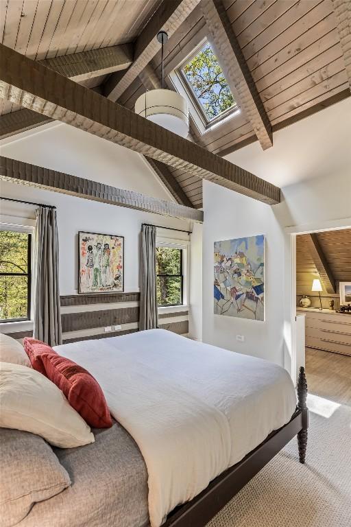 42 W Black Rock Cir, Highlands, NC 28741 - bedroom with a skylight, multiple windows, and wooden ceiling