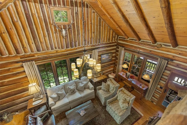 150 Cullasaja Dr, Highlands, NC 28741 - living room with wooden ceiling with exposed beams, high vaulted ceiling, wood finished floors, healthy amount of natural light, and log walls