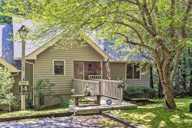 27 Dwarf Mountain Rd Unit 23Un, Sapphire, NC 28774 - view of front of house featuring a porch and a front lawn