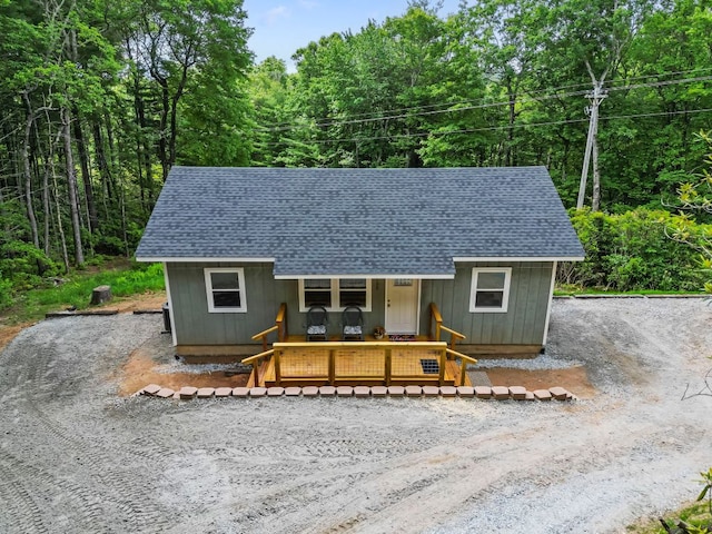 185 Little Elbow Mountain Rd, Lake Toxaway, NC 28747 - view of front facade featuring a shingled roof, a porch, driveway, and a wooded view