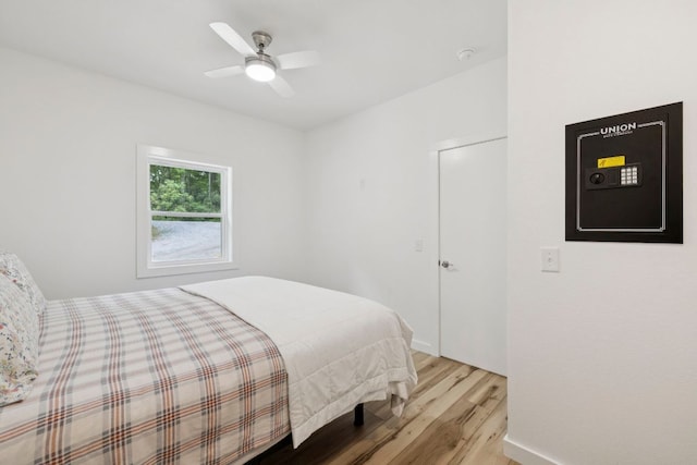 185 Little Elbow Mountain Rd, Lake Toxaway, NC 28747 - bedroom featuring light wood-style floors and ceiling fan