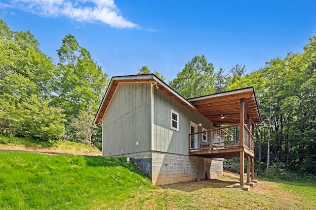 185 Little Elbow Mountain Rd, Lake Toxaway, NC 28747 - rear view of house featuring a wooden deck and a yard